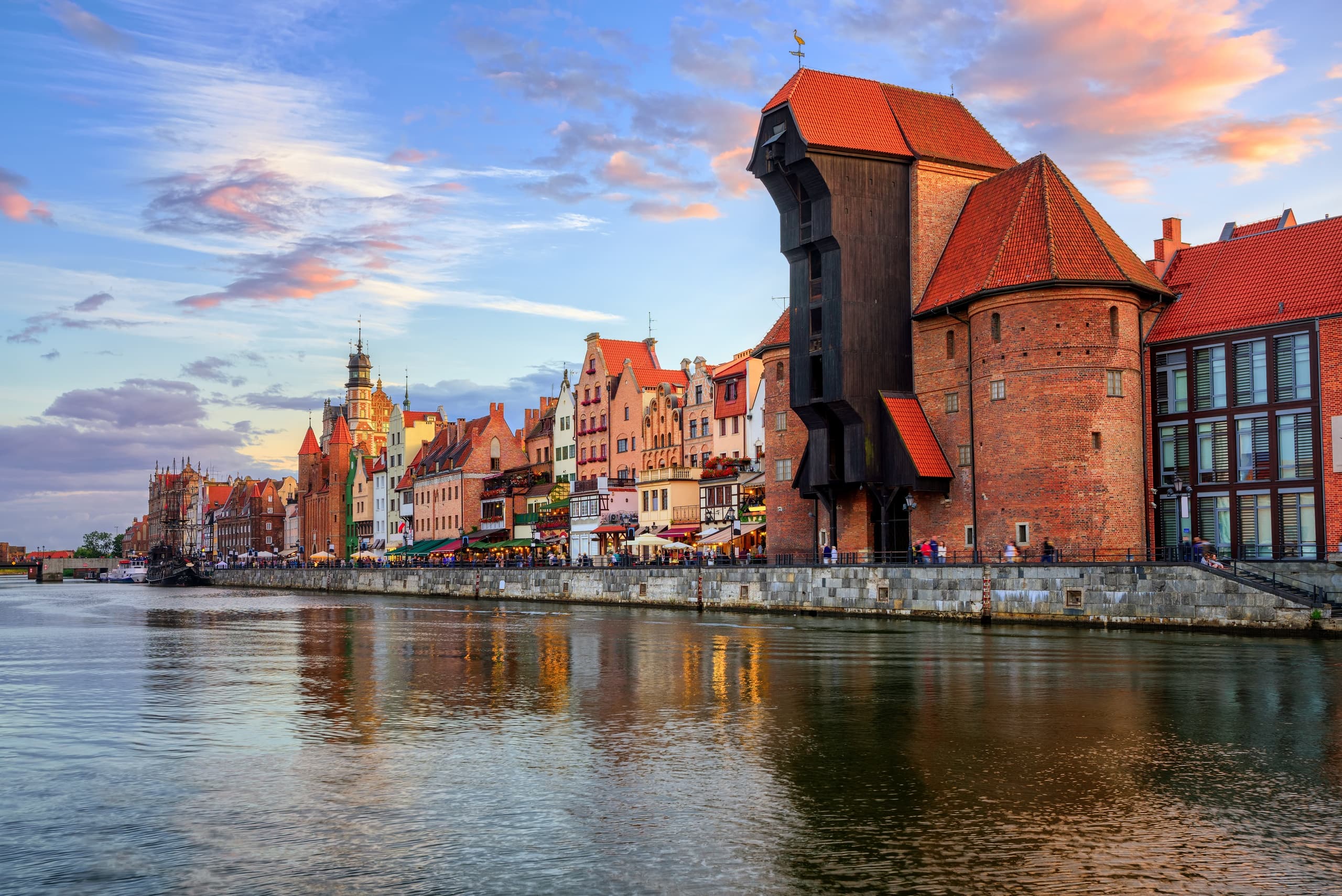 Free walking tour through medieval square with cathedral backdrop