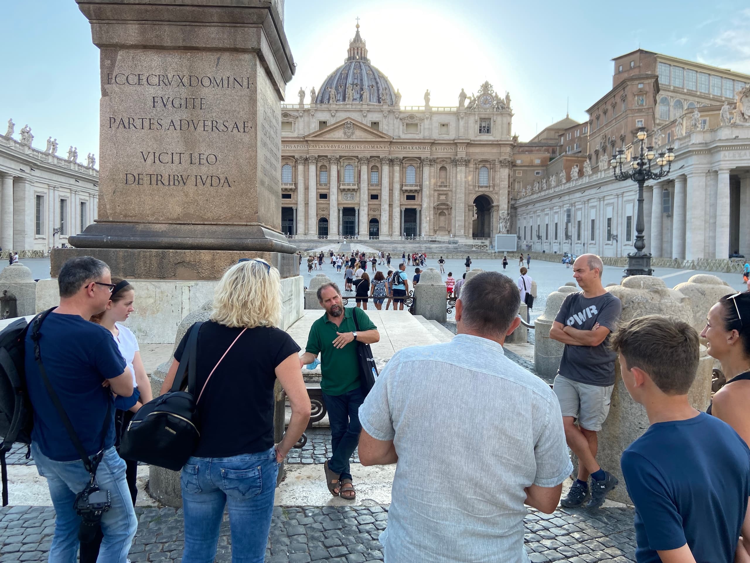 Tour group viewing St. Peter's Basilica at Vatican outdoor tour