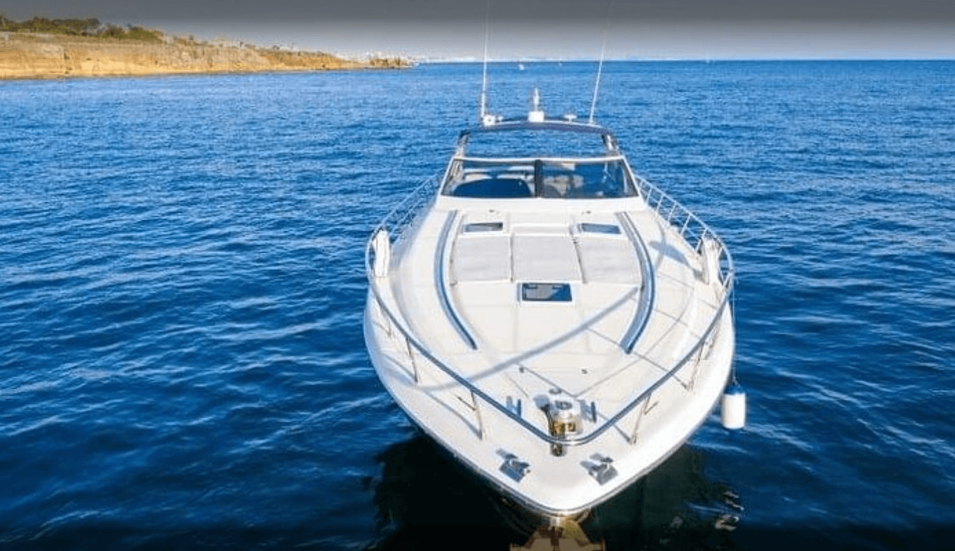 Luxury yacht bow cruising open sea, scenic maritime excursion