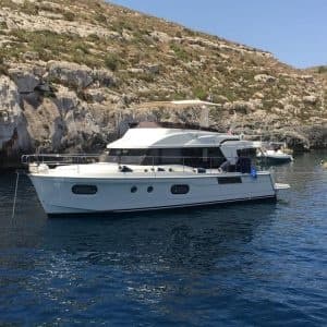 Full-Day Beneteau Swift Trawler Charter from Ta' Xbiex — Explore Malta’s Blue Lagoon, Coves & Dolphins photo 1