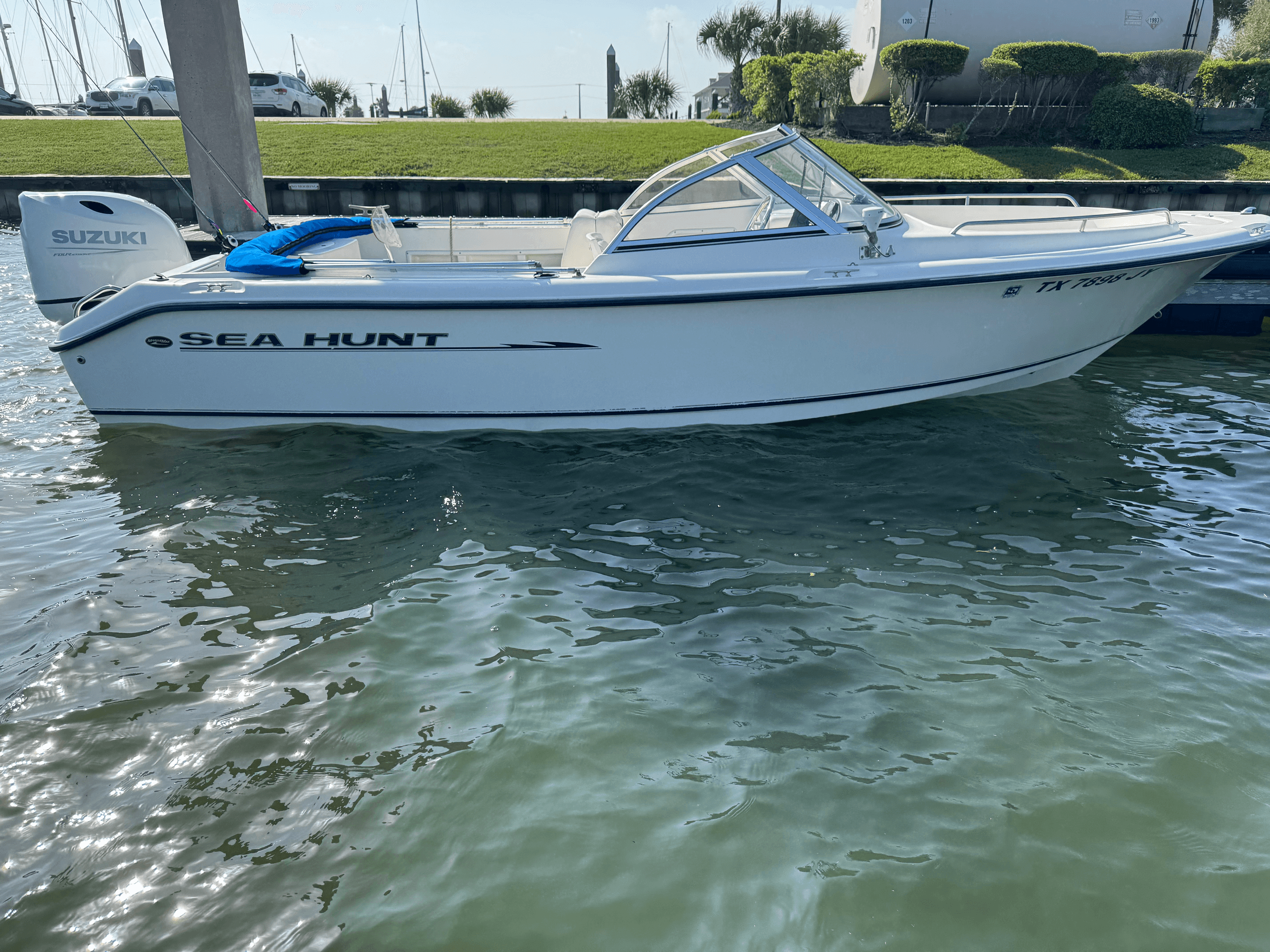 Bowrider fishing boat on calm waters at Galveston shoreline