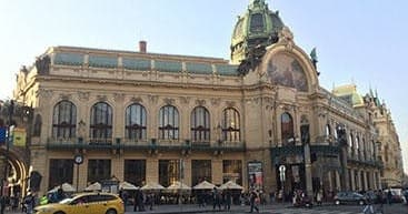 Historic municipal house exterior in Prague, urban cultural walking tour