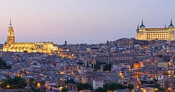 Panoramic Toledo skyline at dusk showcasing historic cityscape