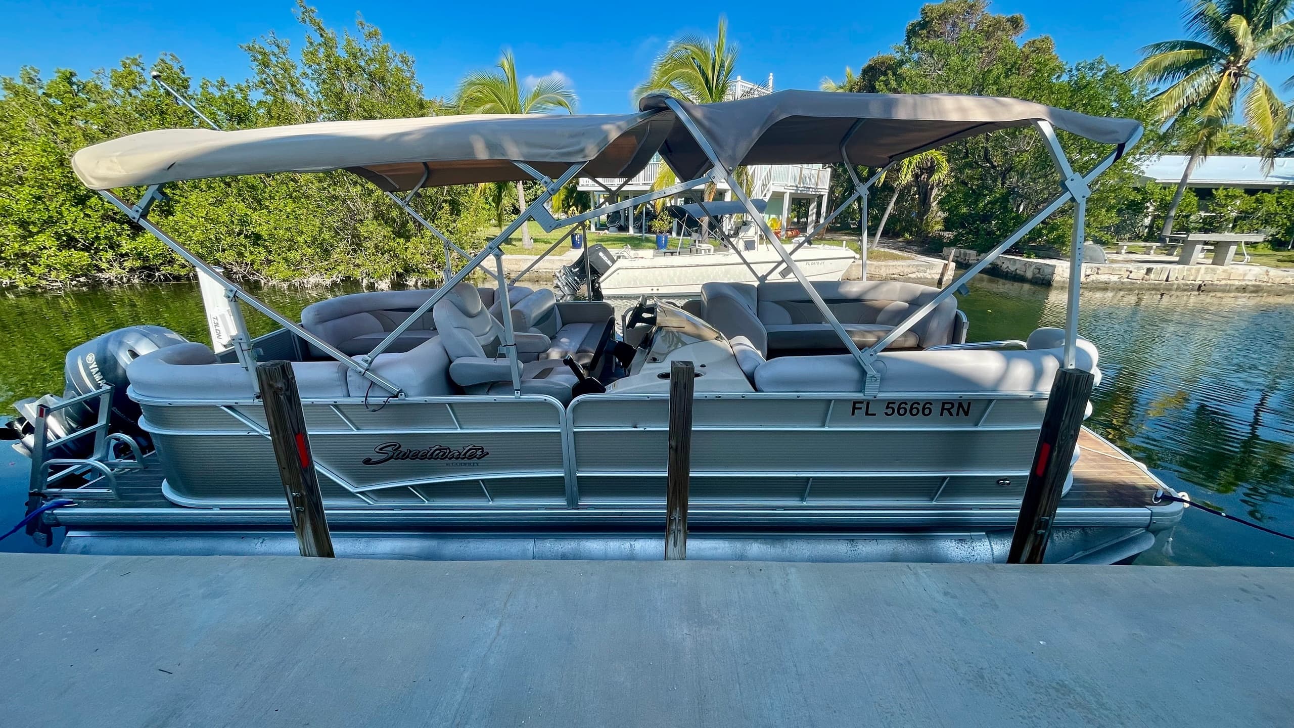 Explore Florida’s Waters Aboard the 23' Tri Toon Pontoon "No Tan Lines"