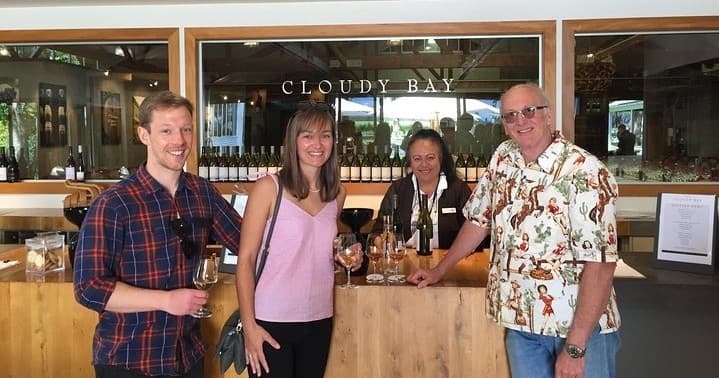 Group tasting wines at Cloudy Bay winery tasting bar in Marlborough