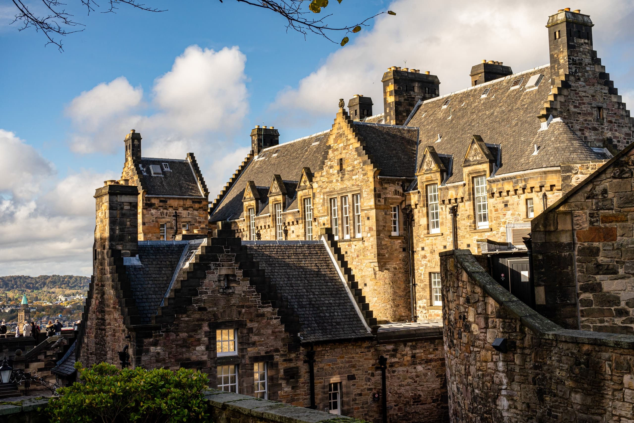 Historic Edinburgh castle rooftops and stone courtyard view