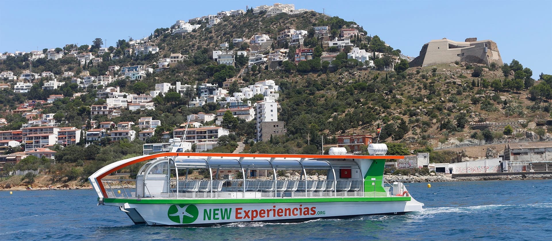 Don Pancho sightseeing boat cruising coastal town waterfront, scenic tour