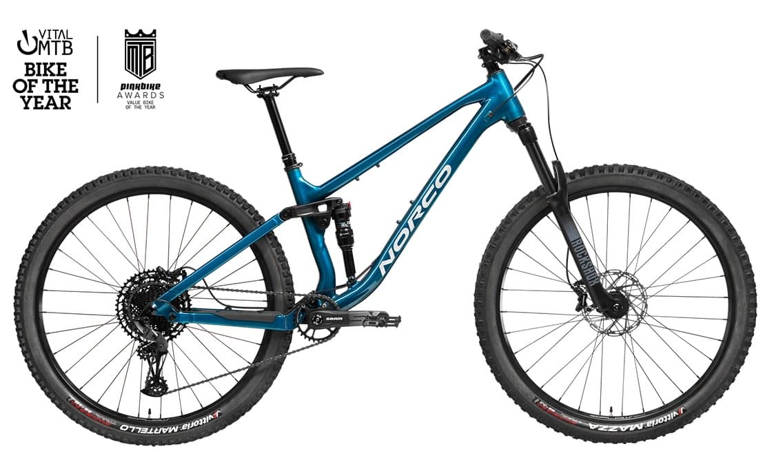 Full-frame blue mountain bike isolated on white studio background