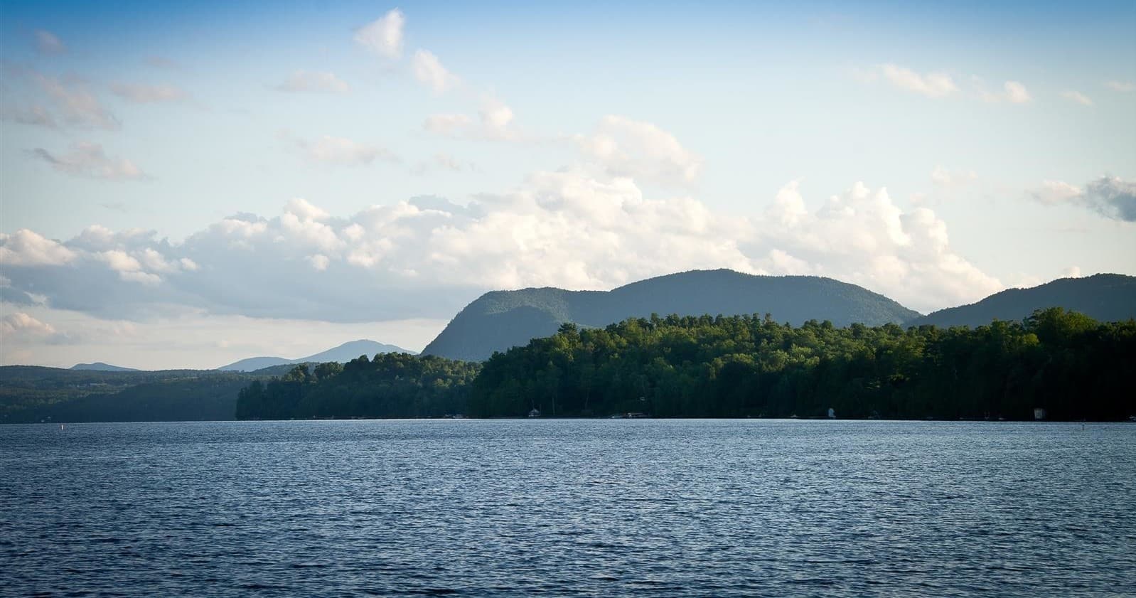 Scenic Lake Memphremagog landscape with distant mountains