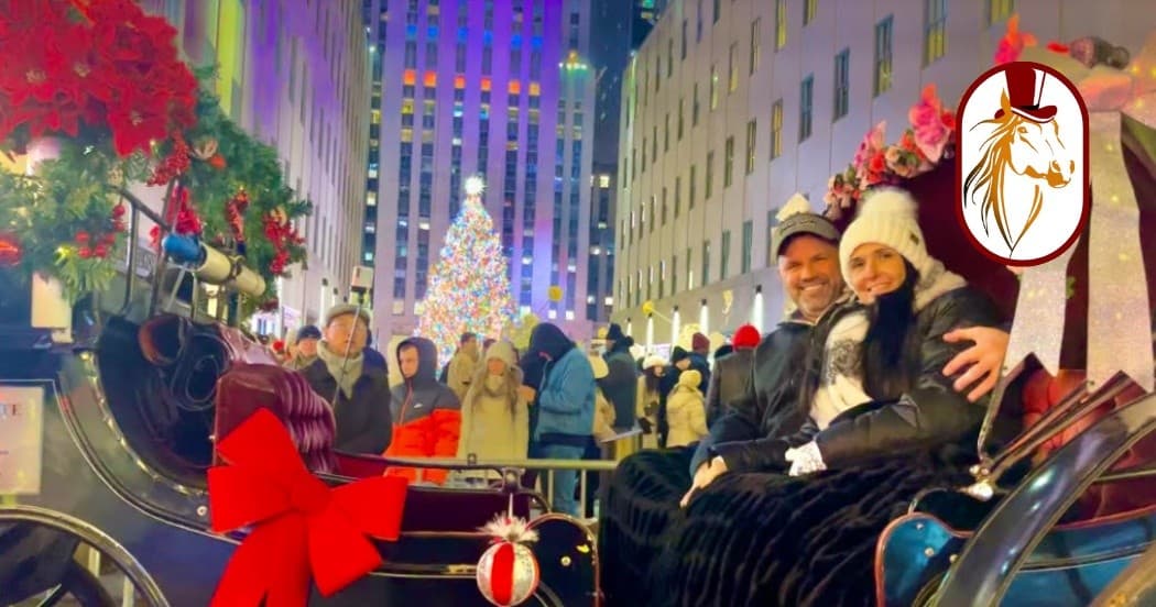 Couple in horse carriage at Rockefeller Center holiday lights
