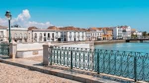 Seaside promenade and ornate railing, waterfront walking tour