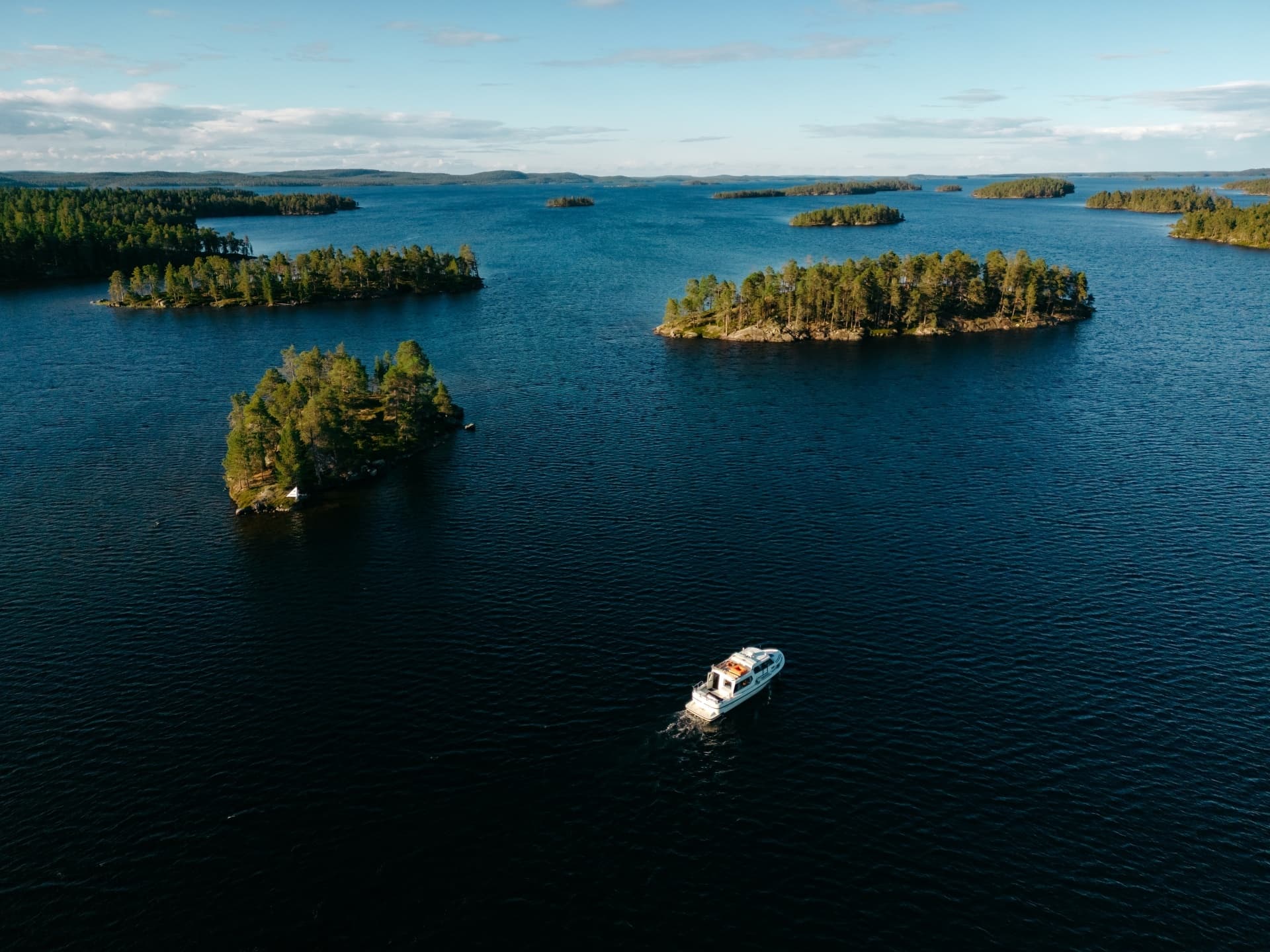 Aerial view of forested lake islands near Inari, Lapland