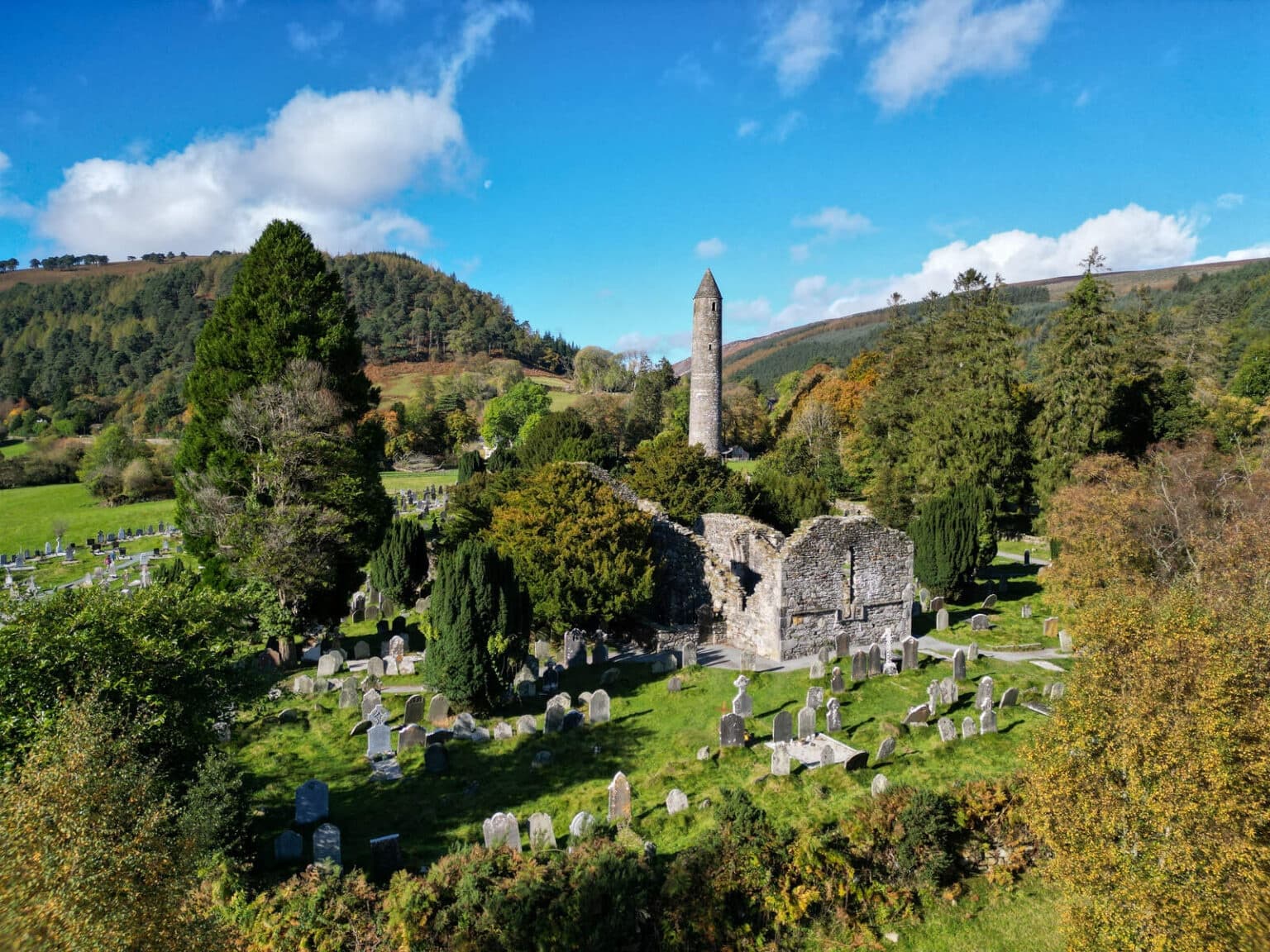 Historic monastic ruins in lush valley offering scenic walks