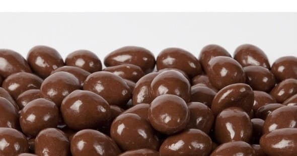 Pile of glossy chocolate-covered malt balls for tasting at Bellmore