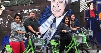 Cyclists riding on guided urban bike tour in Phoenix