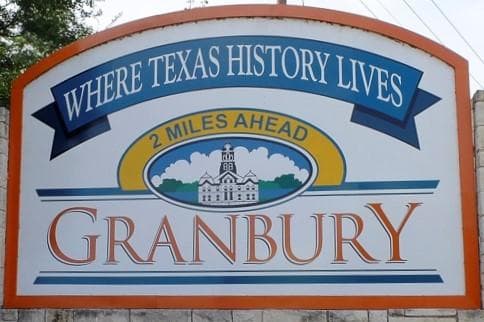 Granbury town welcome sign reading 'Where Texas History Lives'