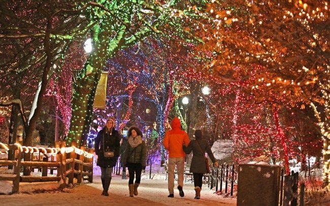 Winter holiday lights walk on Chicago street, festive evening stroll