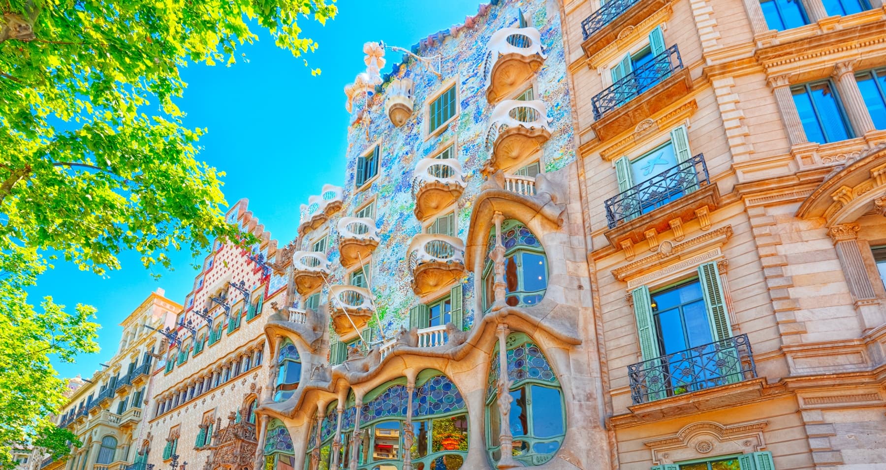 Colorful Gaudi building facade on Barcelona street, architectural walk