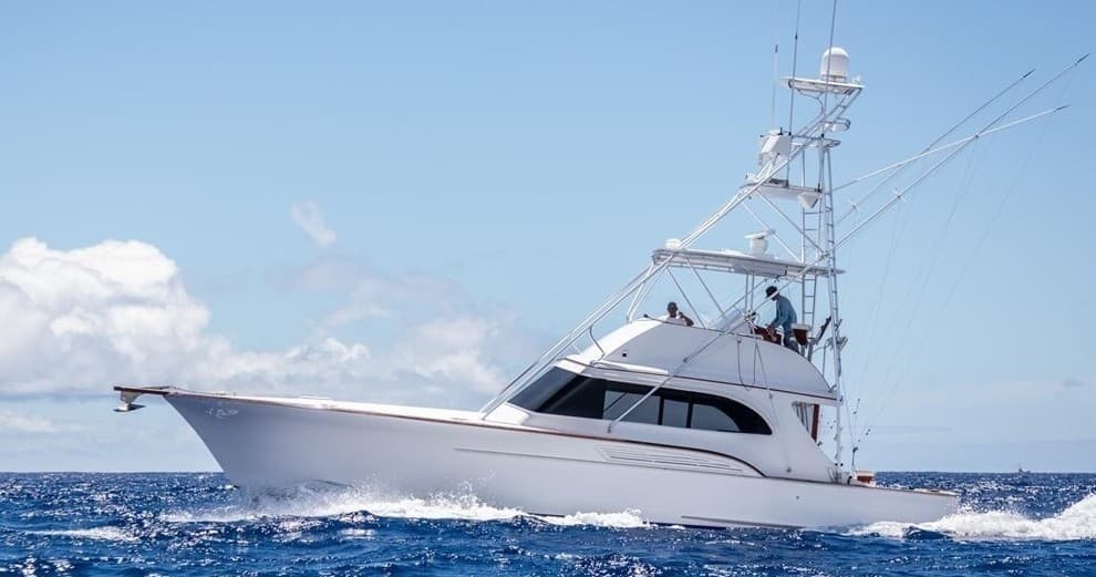 Sportfishing charter boat cruising blue Pacific off Kauai
