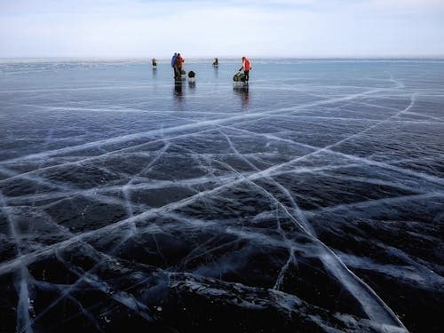 Ice Fishing Adventure with LappiTrip in Rovaniemi, Finland