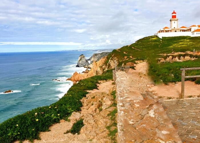 Dramatic coastal cliffs and lighthouse at Cabo da Roca, cliffside hike views
