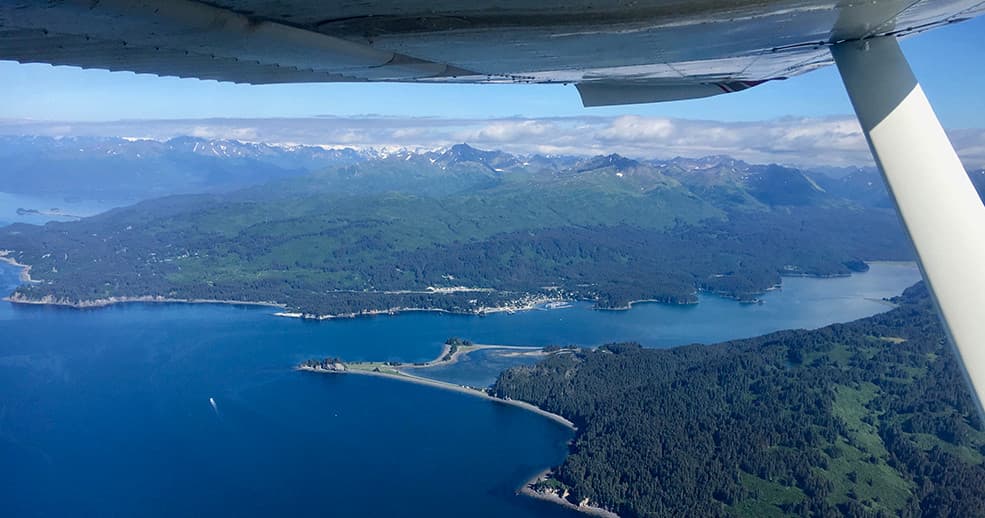 Aerial flight over coastal bays and islands near Seldovia, Alaska
