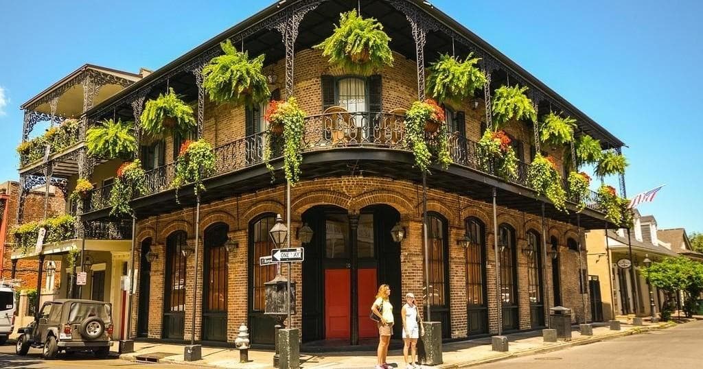 French Quarter street balcony with hanging ferns, New Orleans