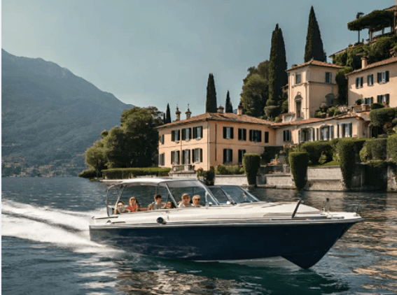 Classic motorboat cruising past villas on Lake Como shore
