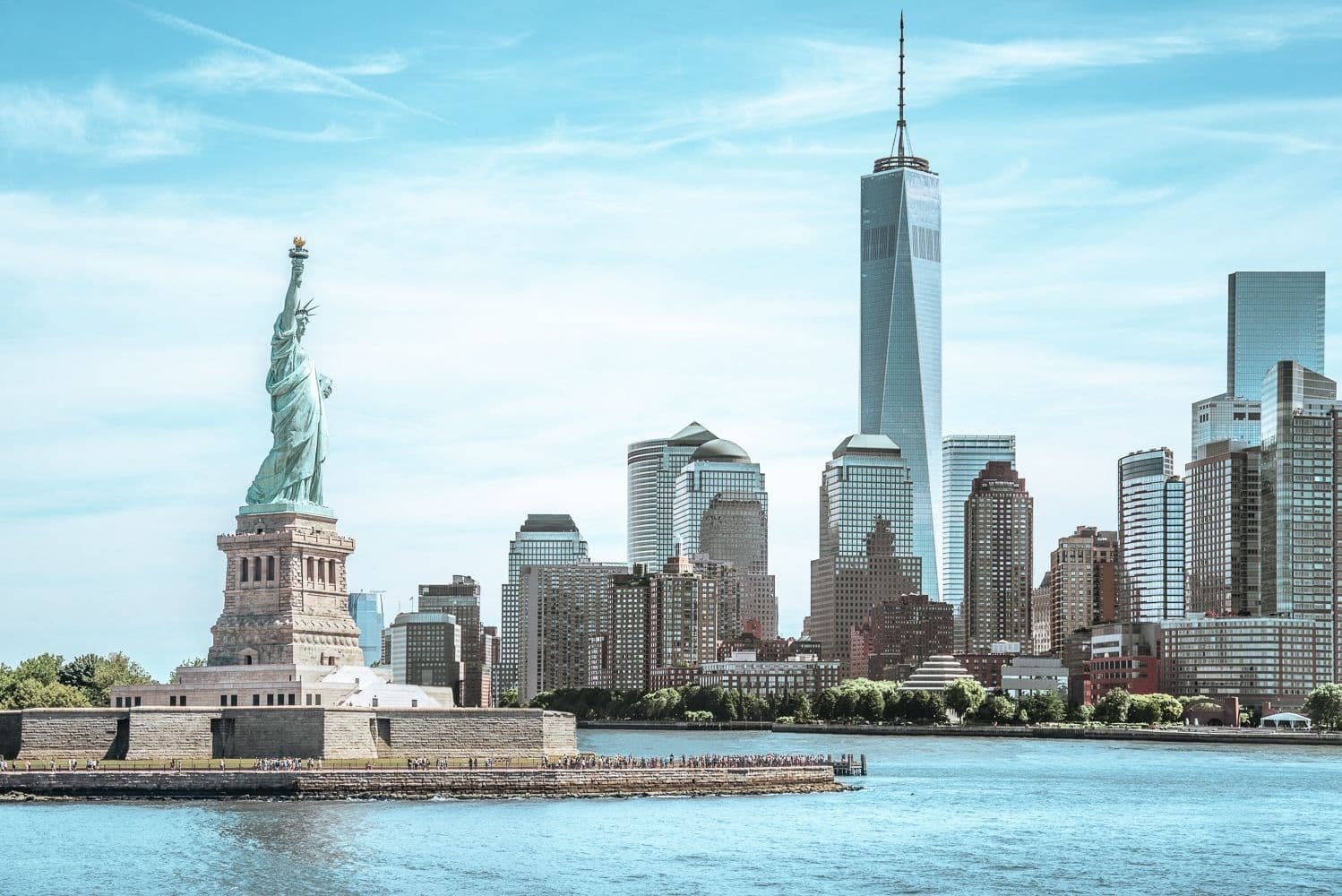 Statue of Liberty with Lower Manhattan skyline in background