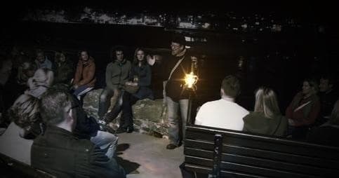 Lantern-lit nighttime storytelling tour by waterfront
