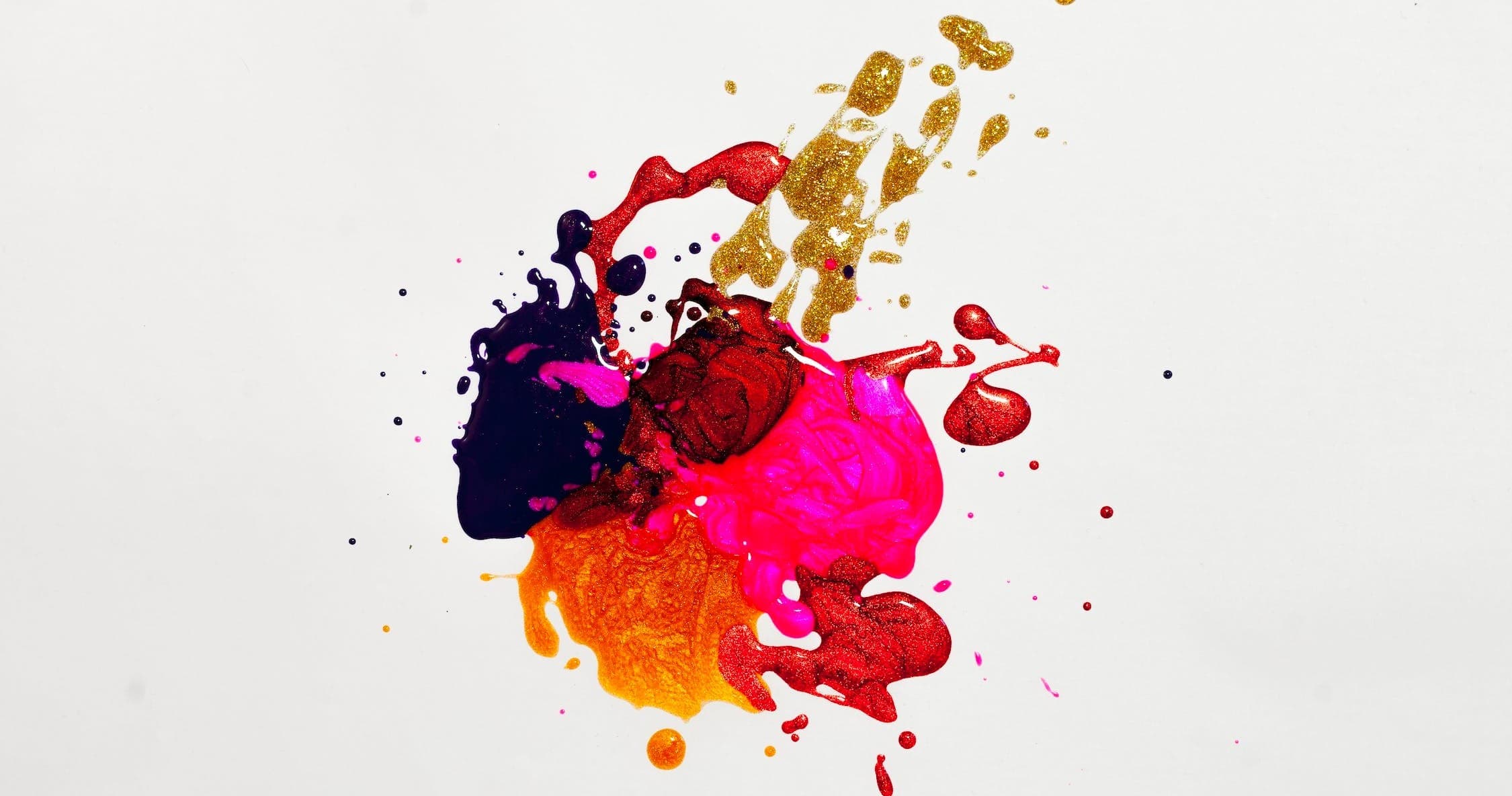 Abstract colorful paint splash on white backdrop, studio art promotion