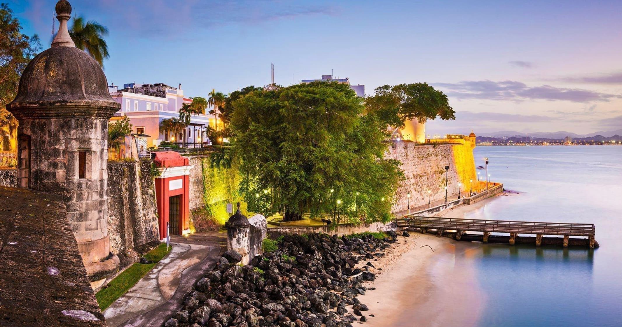 Historic coastal fort and waterfront promenade for sightseeing at sunset