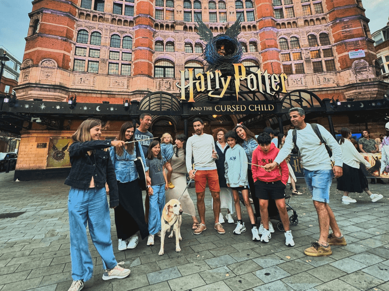 Group walking tour outside the Harry Potter theatre in London