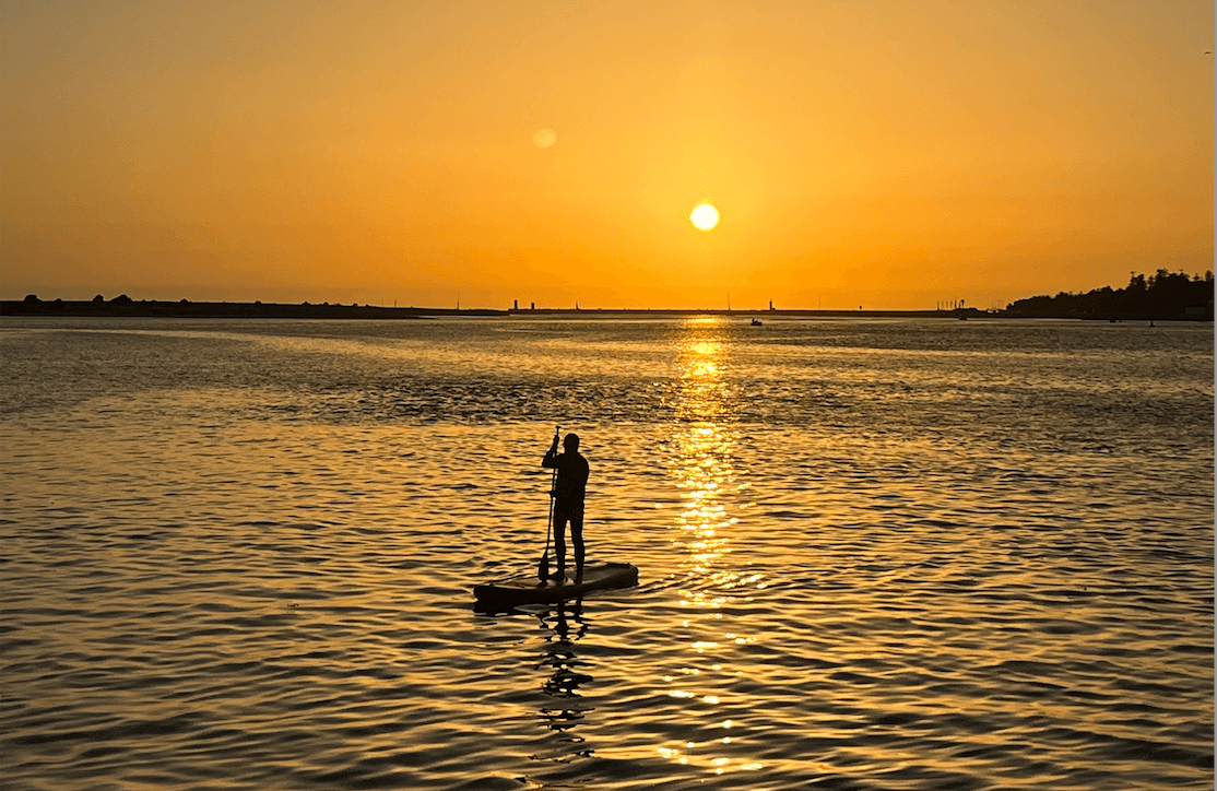 Stand Up Paddleboarding with Pura Vida Surfing Camps in Porto