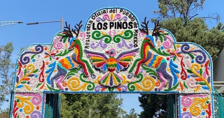 Colorful festival arch Los Pinos entrance in outdoor park