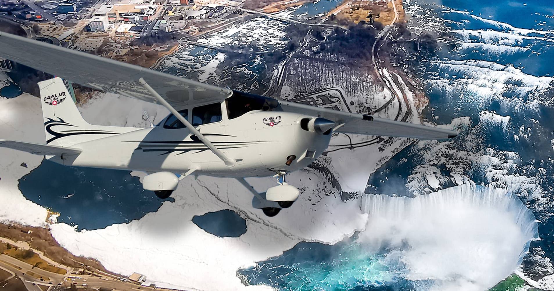 Light aircraft flying over Niagara Falls aerial sightseeing tour