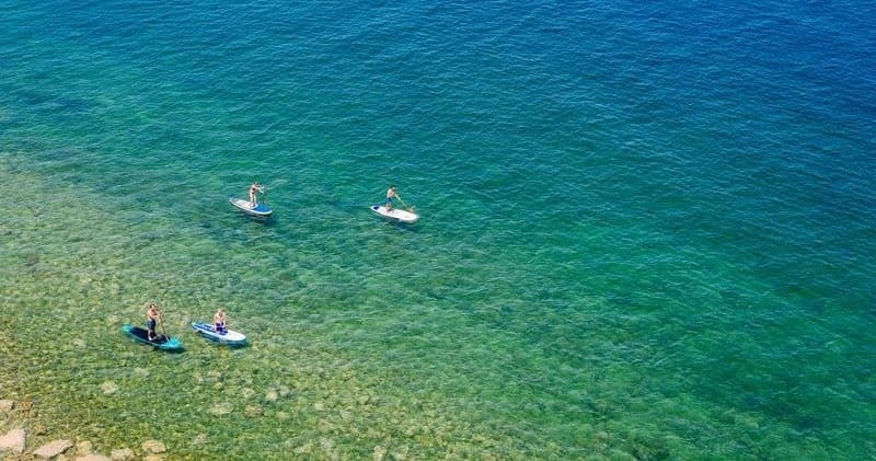 Standup Paddleboarding Coastal Tour by Suds Surf School