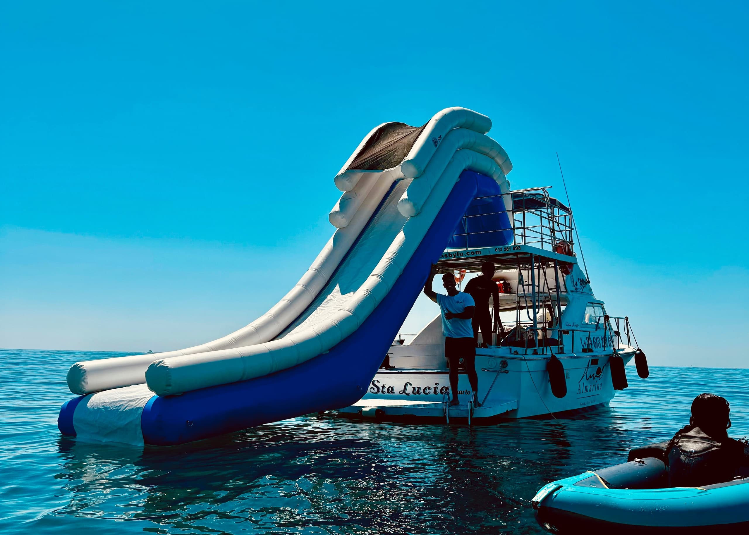Private Mediterranean Boat Adventure from Torremolinos: Snorkel Wrecks, Dolphins & XXL Slide photo 1