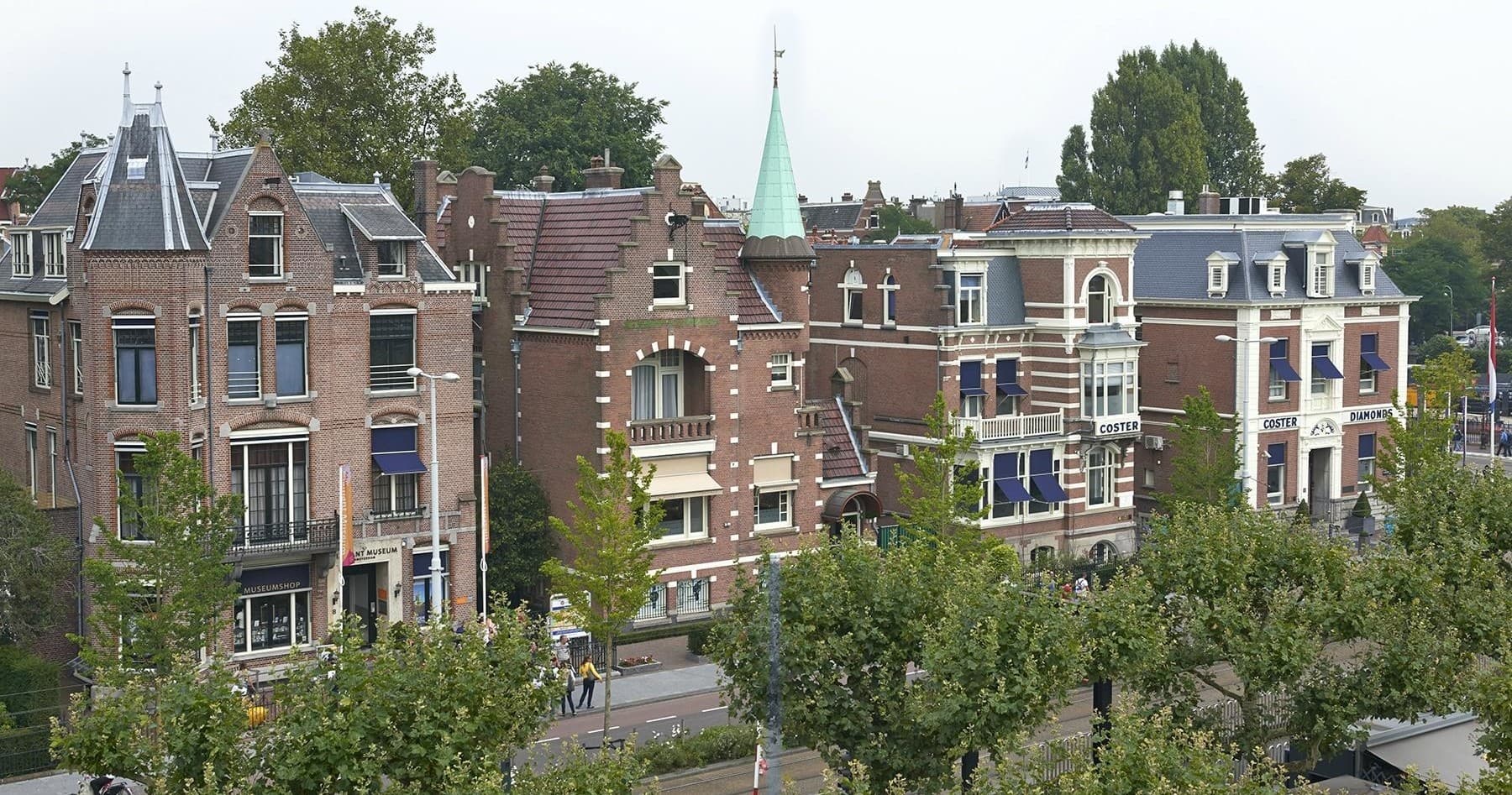 Historic Amsterdam canal-front houses skyline, urban view