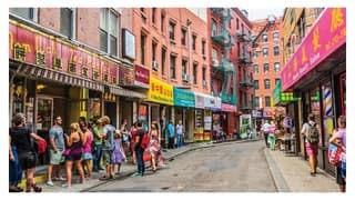 Bustling Chinatown market street in Manhattan, colorful walking tour