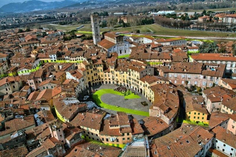 Aerial panoramic view of Tuscan town and rolling countryside