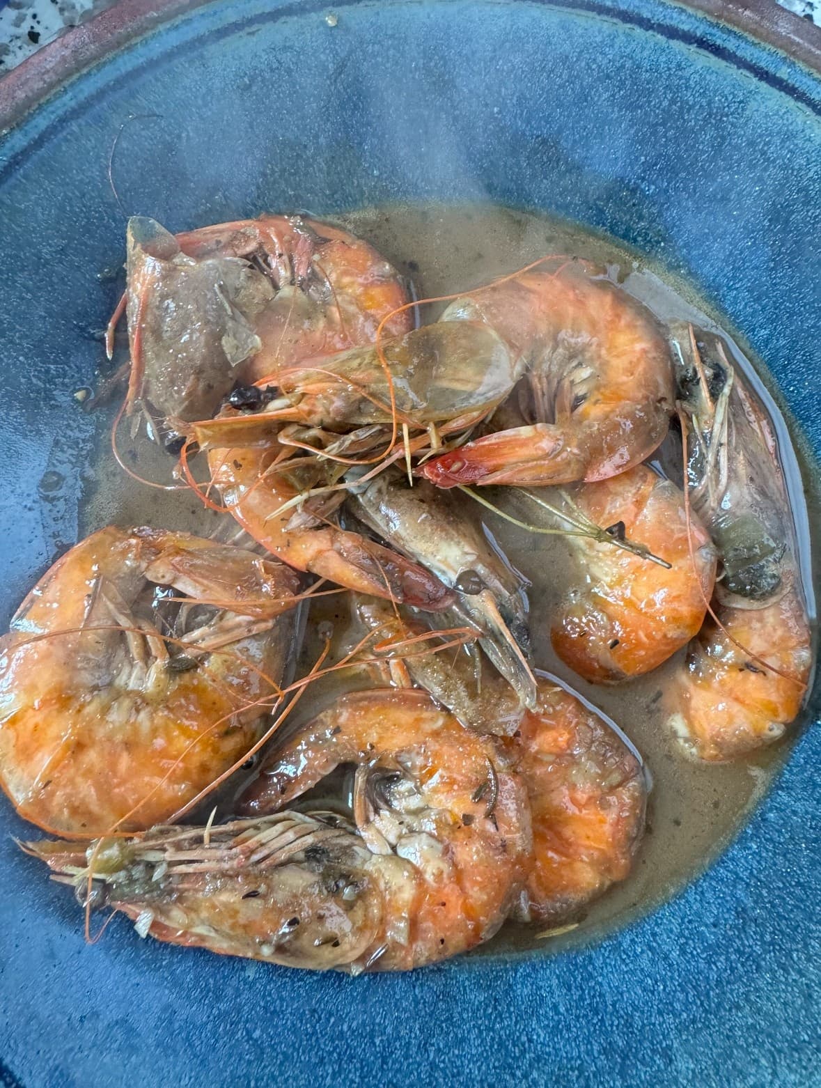 Steamed whole Gulf shrimp in bowl, Louisiana seafood boil