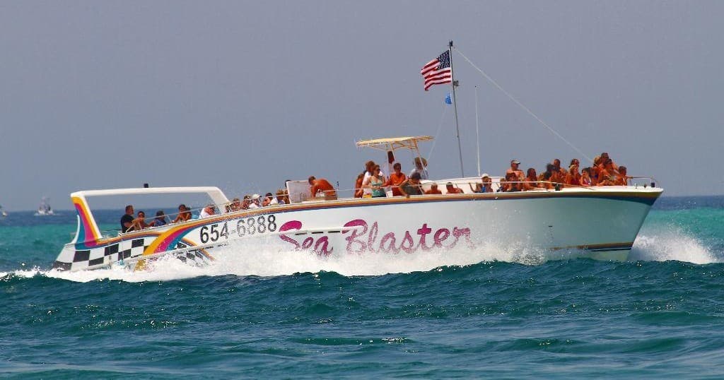 Sea Blaster speedboat full of passengers on coastal thrill tour