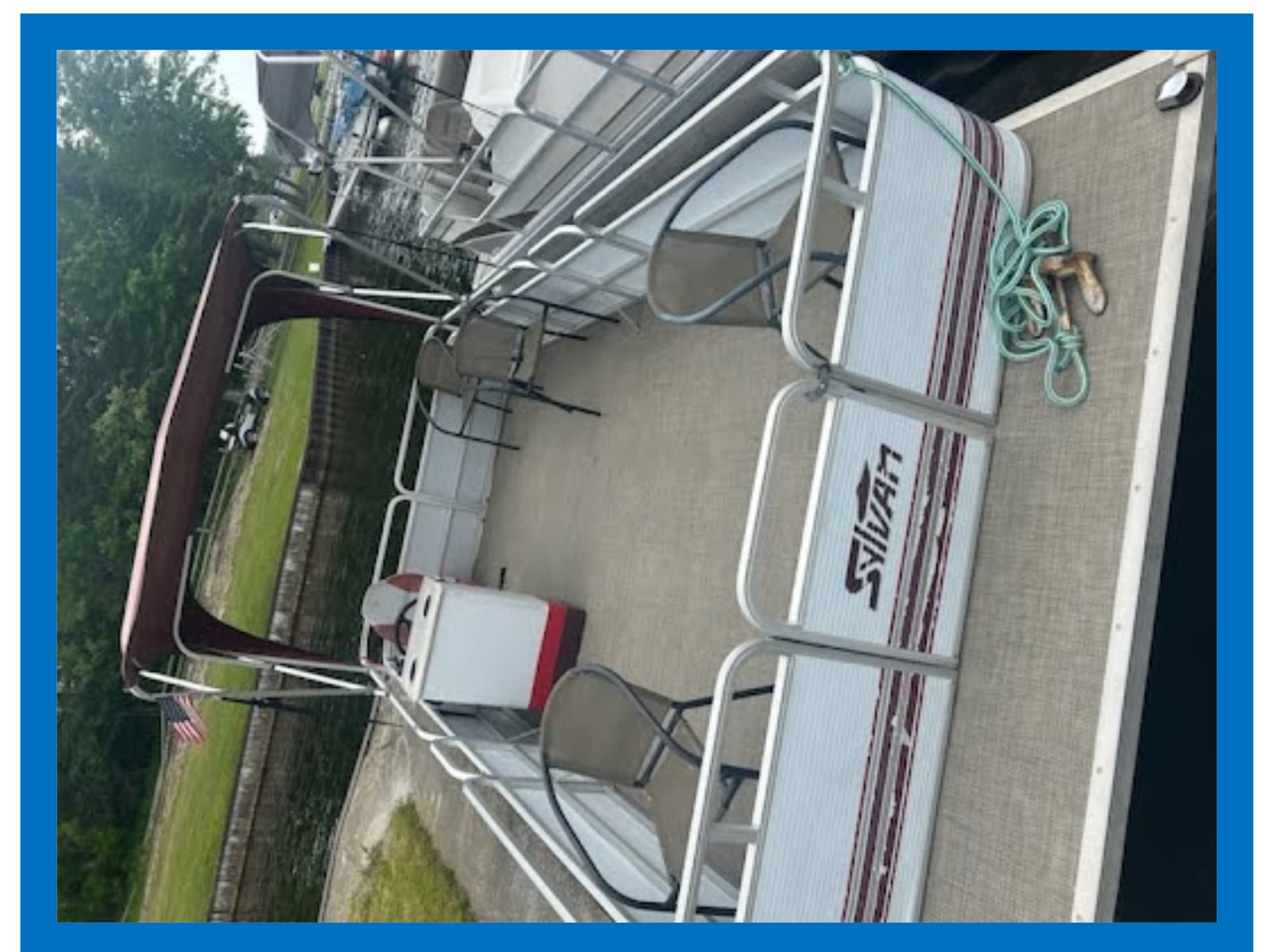 Aerial view of pontoon interior moored at marina, limited scenery