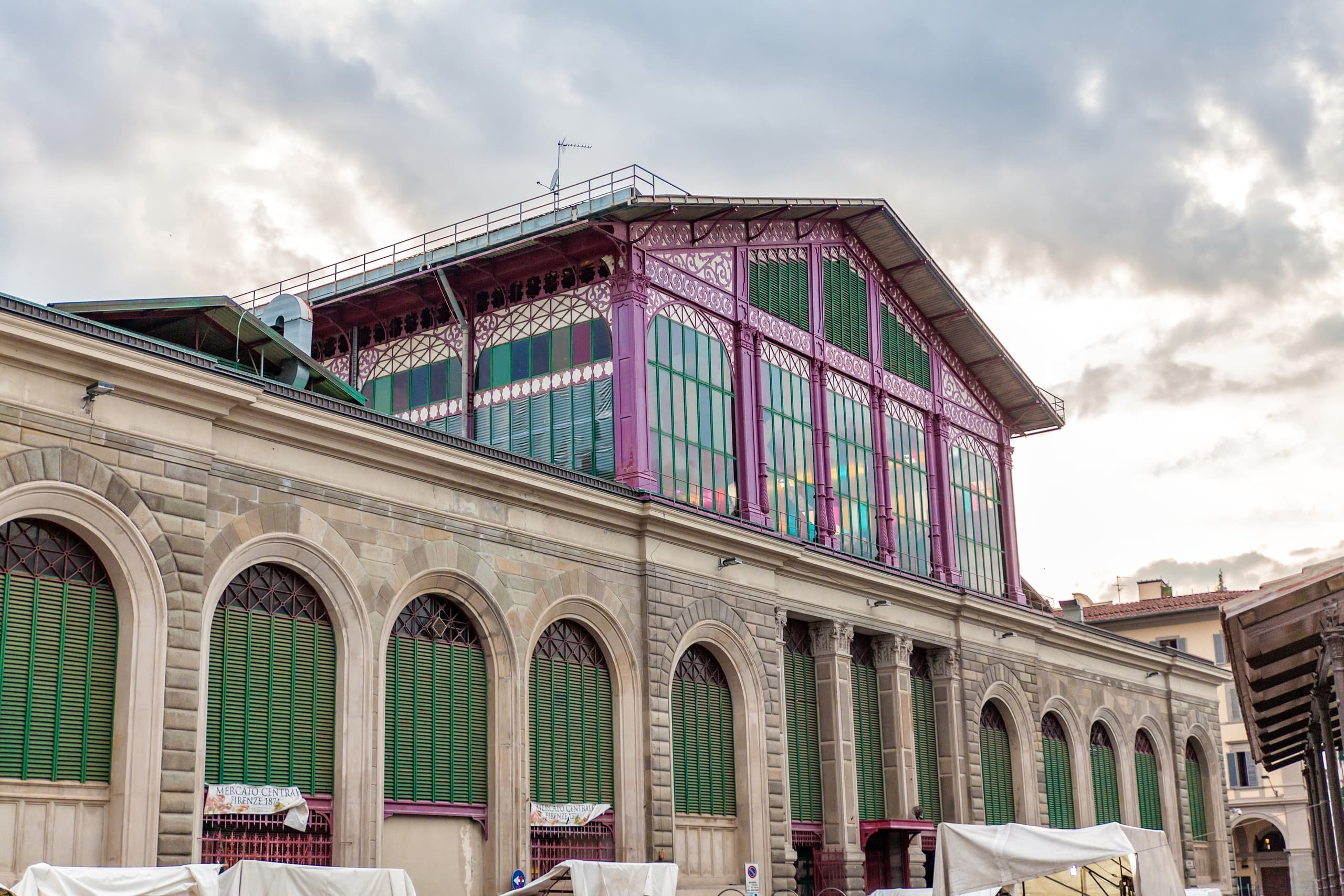 Historic Florence central market facade at sunset, outdoor market