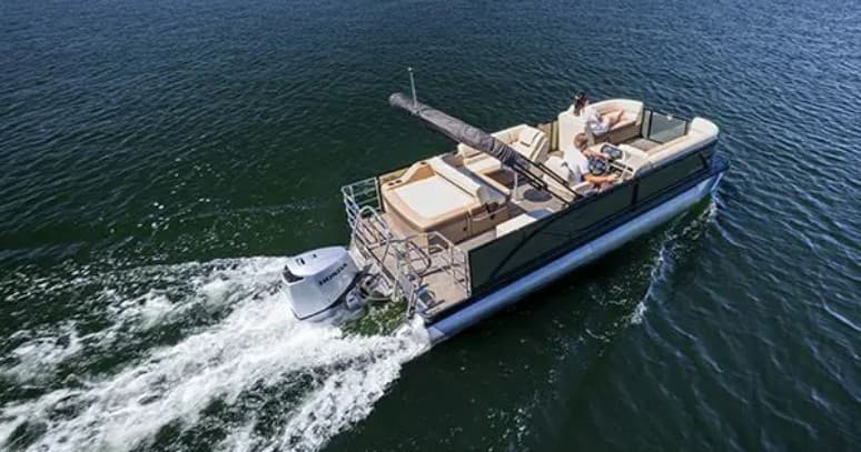 Motor yacht cruising coastal waters, leisure boating on open sea
