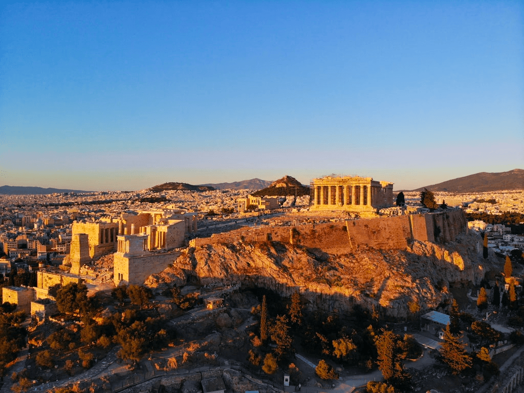 Sunlit Acropolis and Parthenon overlooking Athens, ancient ruins