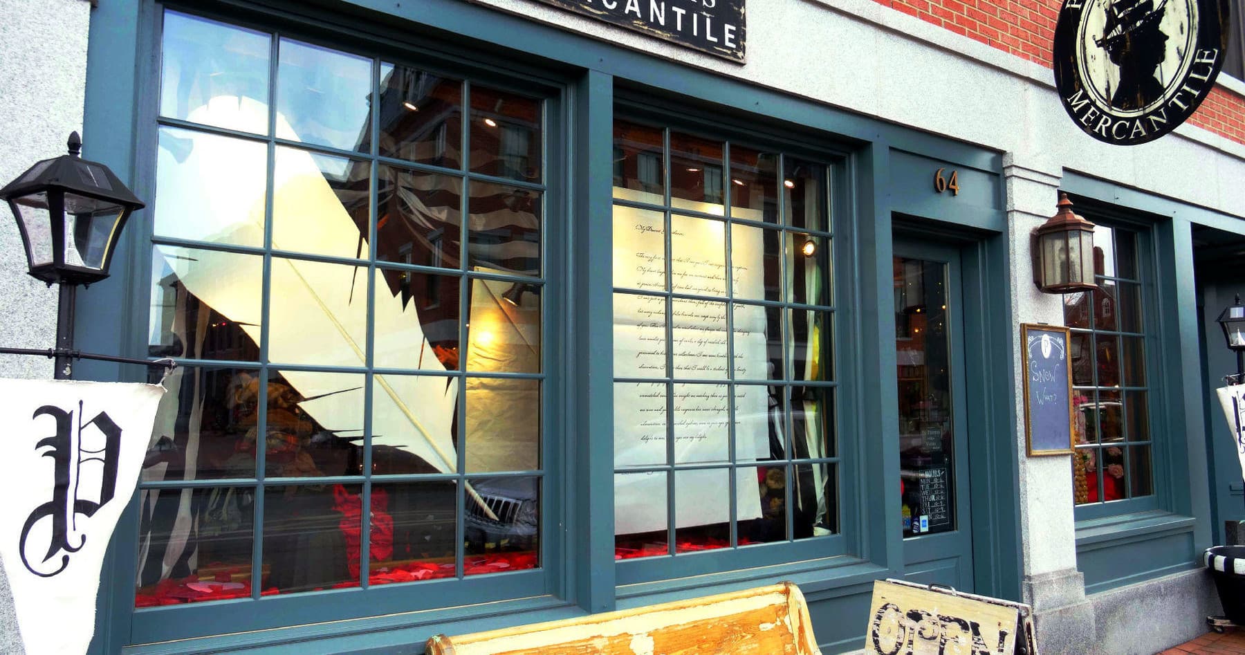 Historic mercantile storefront on cobblestone street display