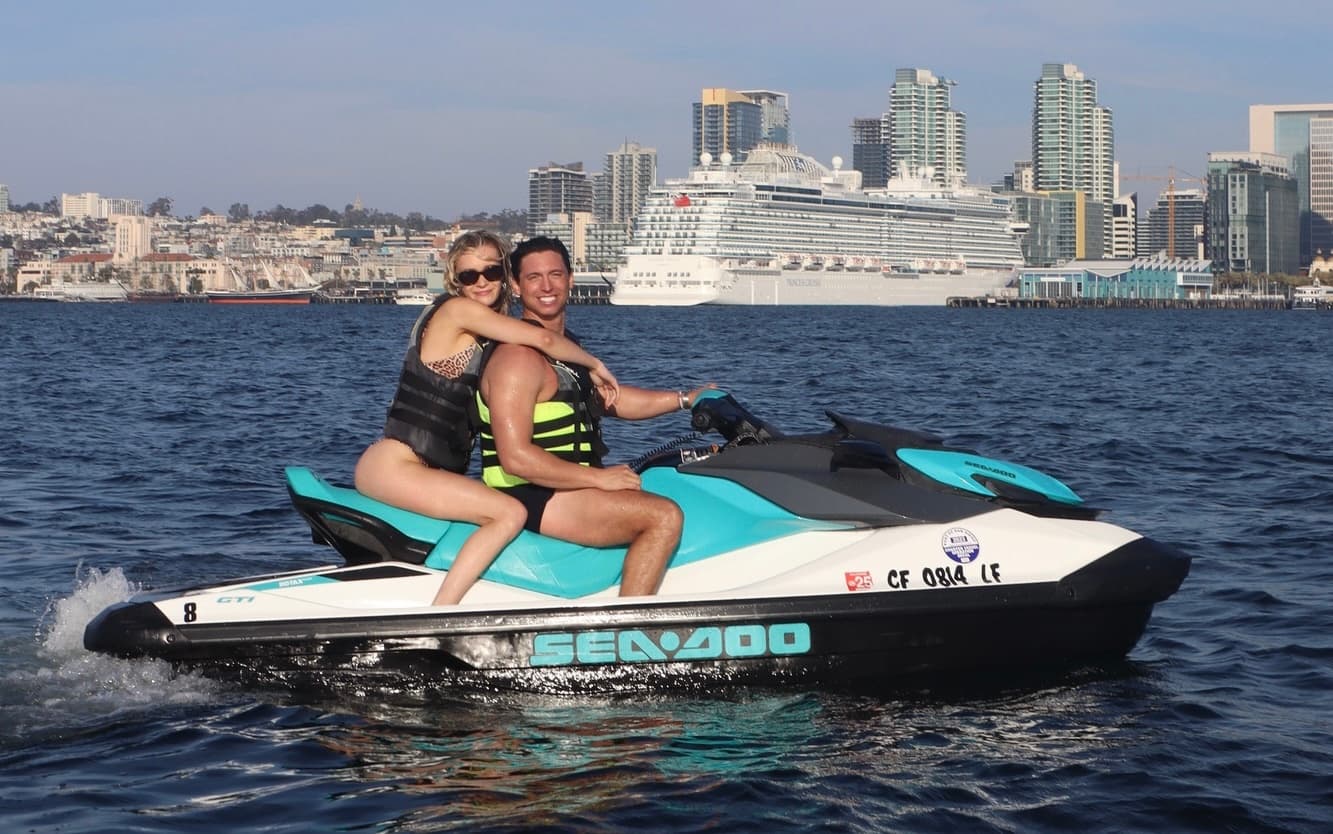 Two riders on Sea-Doo jet ski in San Diego harbor, thrill