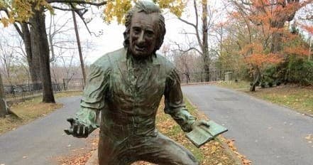 Bronze statue along tree-lined road, Bordentown outdoor walking tour